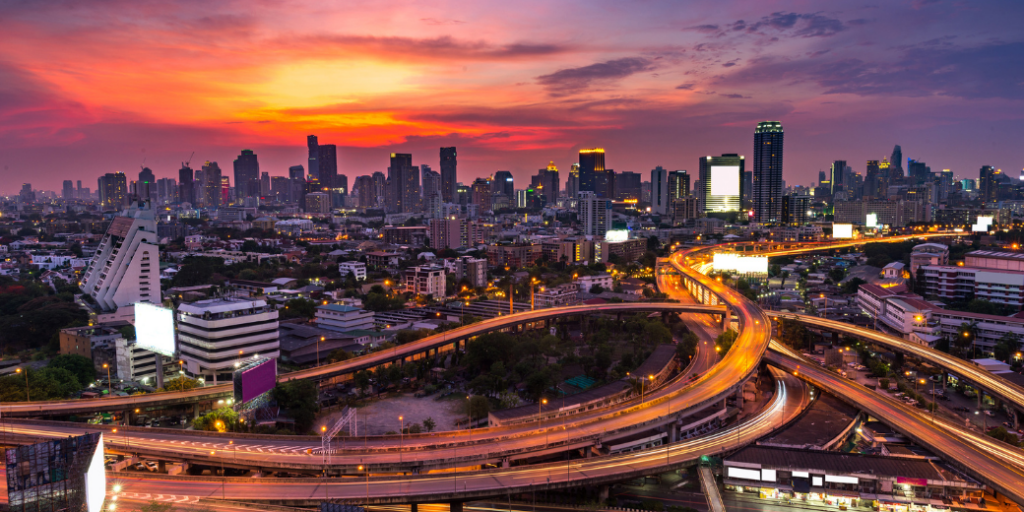 A nighttime cityscape of a city in Asia