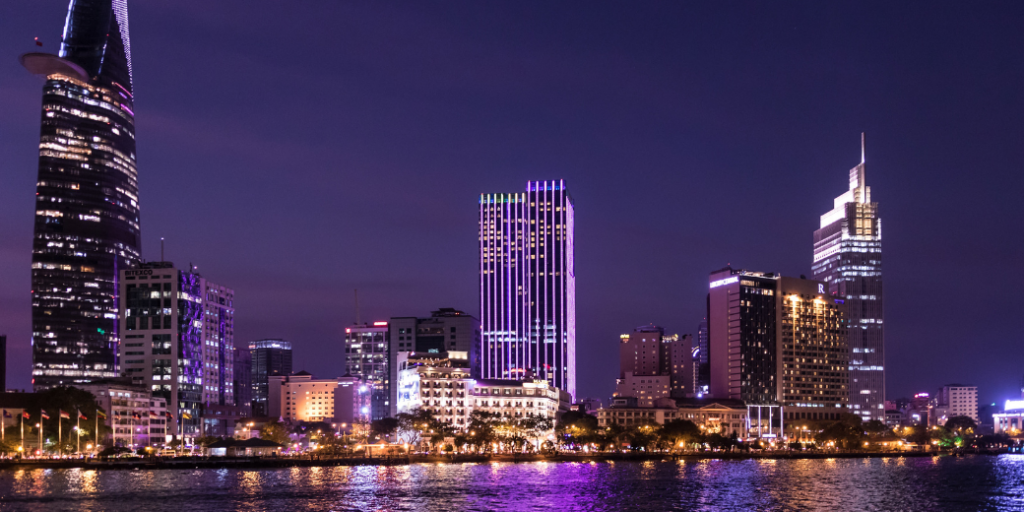 A nighttime cityscape of an Asian metropolis