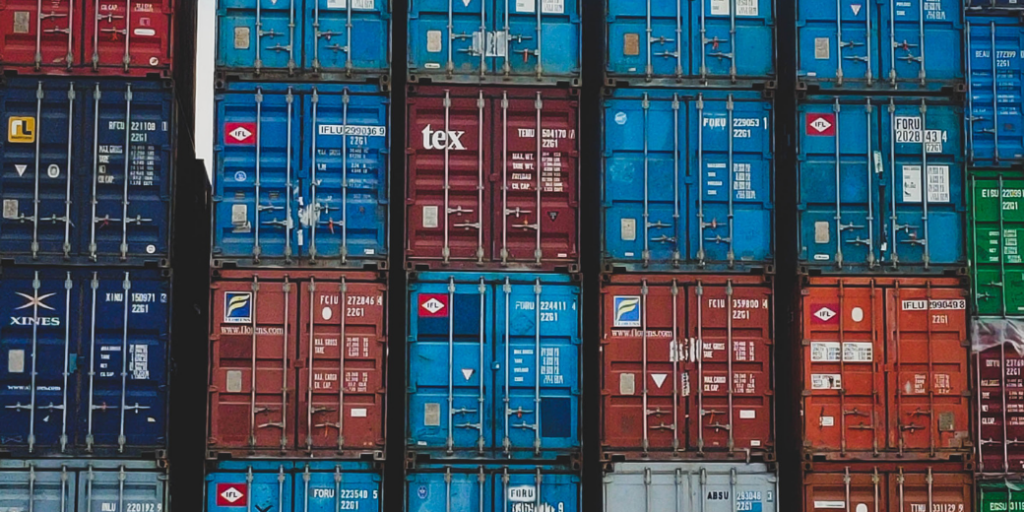Image of the Logistics industry. Stacked Cargo Containers